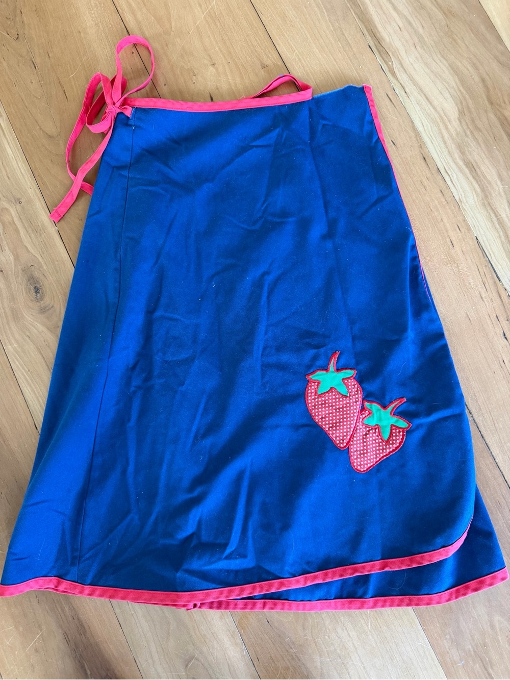 Women’s Blue Wrap Skirt with Pink Trim and Strawberry Appliqué